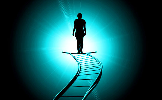 From Faith to Transformation through Connecting with the Spirit World silhouette of a person standing on the last rung of a walkway into the sky