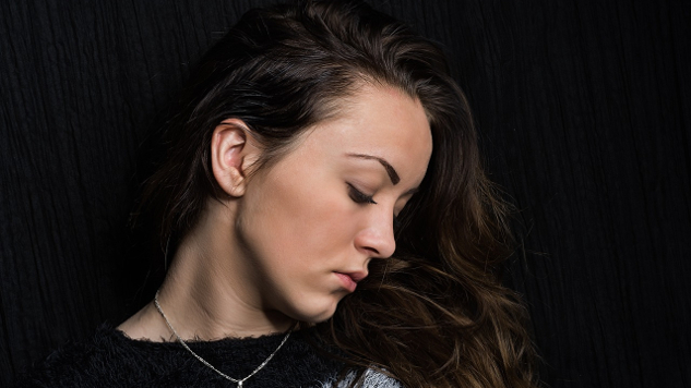 The Power of an Apology -- and the Cost of Not young woman looking downwards sadly