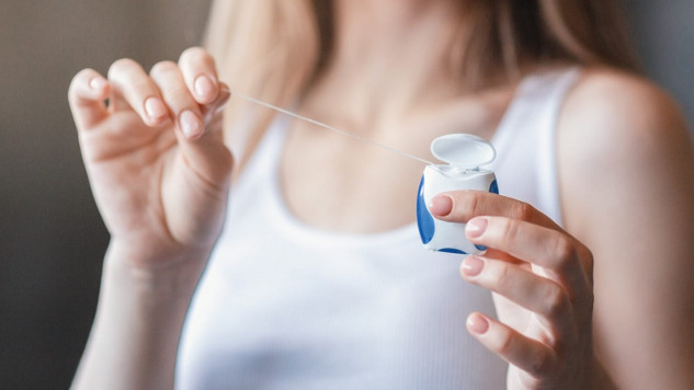 You Might Be Flossing Your Teeth All Wrong proper flossing 9 20