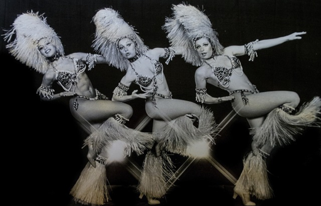 Three dancing cabaret showgirls.&nbsp;Image by Booth Kates from Pixabay.&nbsp;